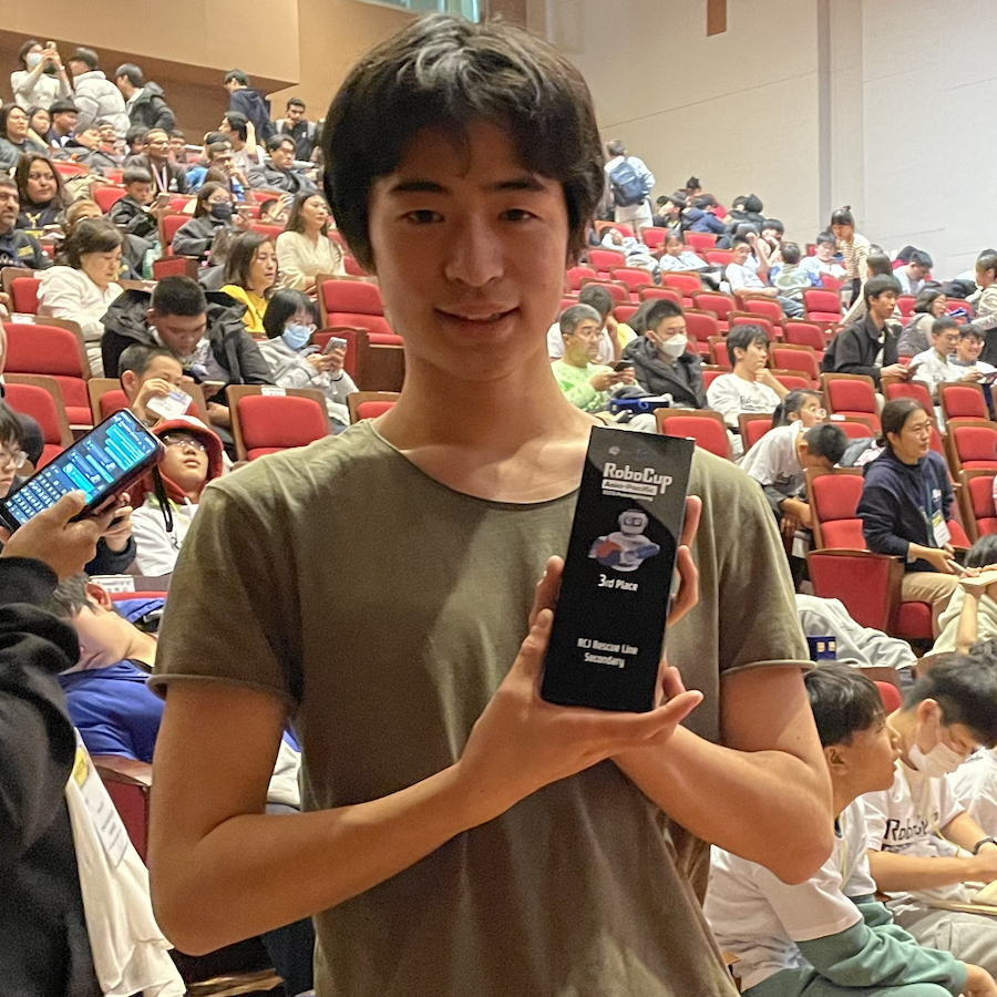 Kent Nakai shows his third place award at RoboCup 2023 in South Korea