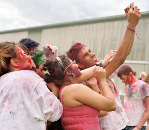 Stuents taking a selfie at the Holi festival
