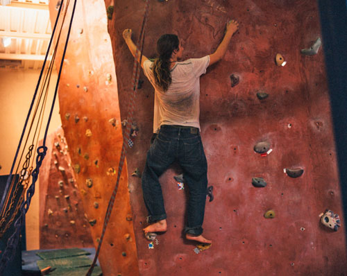 Academy student on the climbing wall in the KAC